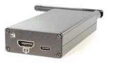 A grey colored box with an HDMI port on it.