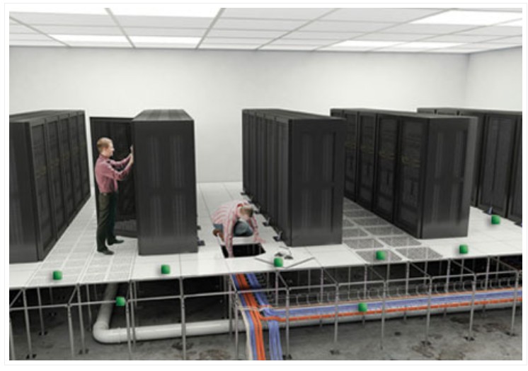 2 men working inside the floor of a data Center.